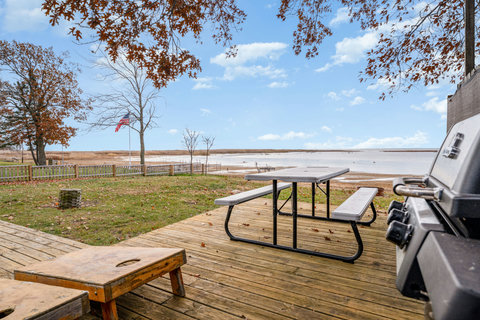 Deck with gas grill, picnic table and chairs