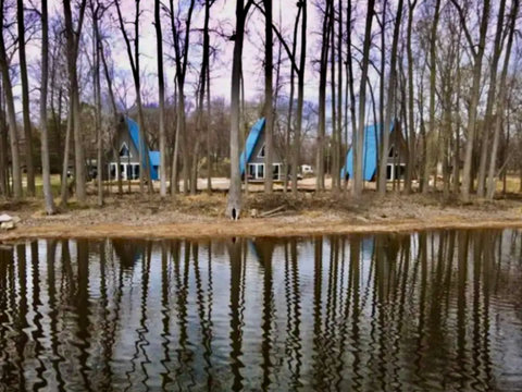 A Frame Cabins next to each other