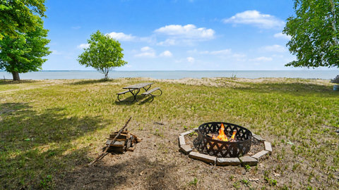 Granny's Cabin fire pit and lake view