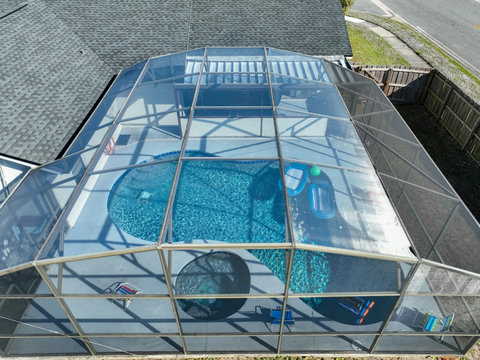 Heated Pool and Spa/Jacuzzi with toys floating devices,  beach chairs and mosquito net fence for confort.