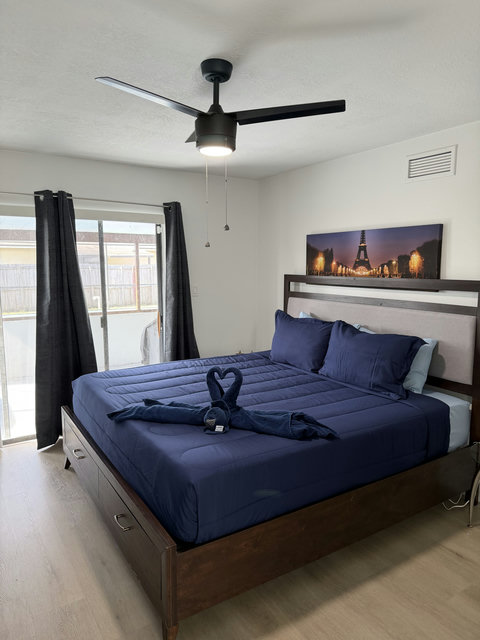 King  bed Suite with premium linens and direct sliding-door access to the pool and spa and a full bathroom attached. Smart Tv, Printer, Board games, Bidet in toilet, Crib inside closet.
