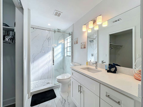 full bathroom with bidget , closet and attached to the master bedroom.