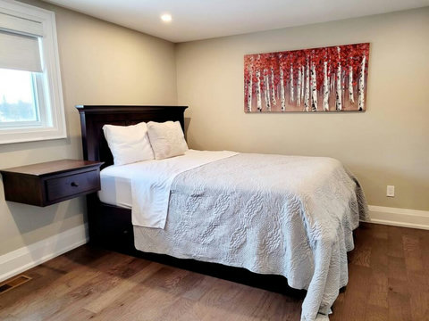 Master bedroom with walk in closet and en-suite
