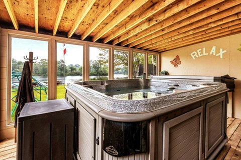 Hot Tub with view of the beautiful Gull River.