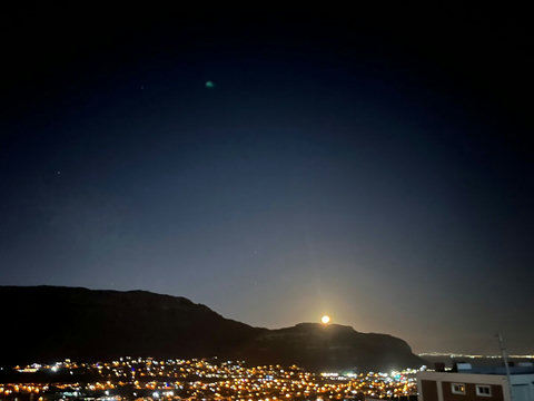 A stunning night view of the bright summer moonlight illuminating the valley.