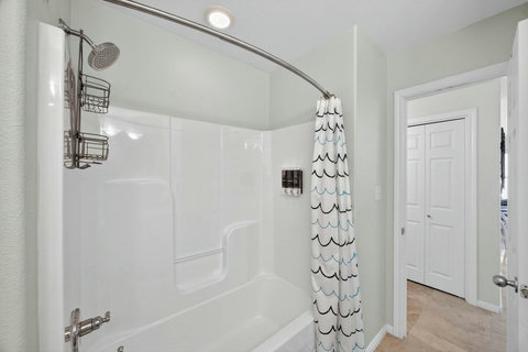 Hallway Bathroom - Bottom Floor 
Bathtub + Shower combo