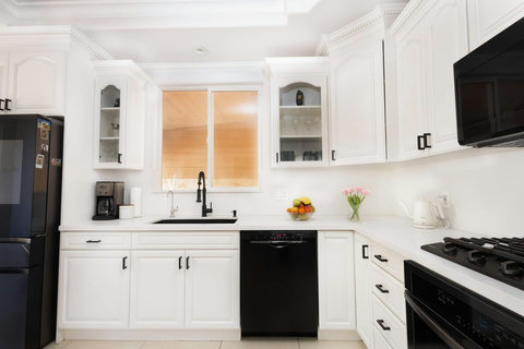 Spacious kitchen with modern appliances and plenty of cabinet storage