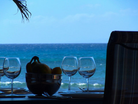 Enjoy oceanfront dining from your private lanai!