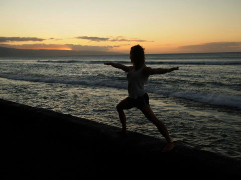Warriors pose.  We have 4 eco-friendly yoga mats so you can leave your mat at home!