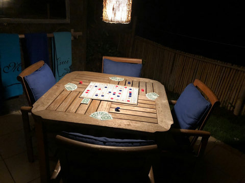 Enjoy the evening sounds of the ocean and the absolute privacy while playing board games or cards on the lanai.