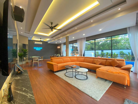 Living room with open view directly to pool