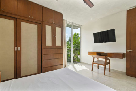 Unwind in style in our cozy second bedroom, designed for relaxation and equipped with everything you need for a perfect Tulum holiday!  #TulumLuxury #DoubleBedComfort #RestAndRecharge