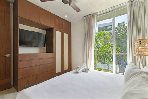 Retreat to the luxurious master bedroom featuring a spacious king-size bed, perfect for restful nights after exploring Tulum! ️ #LuxuryLiving #TulumRetreat