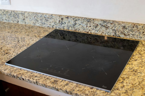 Equipped with modern appliances, including a microwave and cooking stove, our kitchen is designed for convenience and functionality!  #ModernAppliances