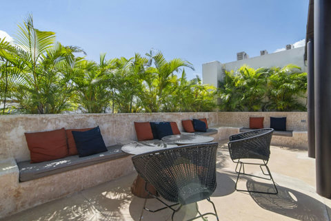Elevate your Tulum experience in our spacious shared rooftop area, where plenty of seating invites you to relax, socialize, and soak in spectacular views! ✨ #RooftopVibes #TulumChill #SkyHighRelaxation