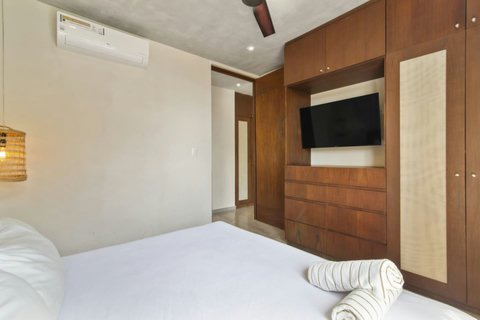 Elevate your vacation experience in our elegant master bedroom, where comfort meets sophistication—your peaceful hideaway in Tulum awaits!  #PeacefulRetreat #TulumElegance #KingSizeComfort