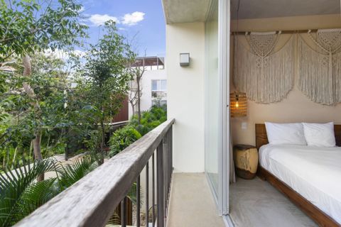 Private balcony with lush jungle views and direct access from the bedroom—perfect for enjoying a peaceful morning coffee or evening breeze.