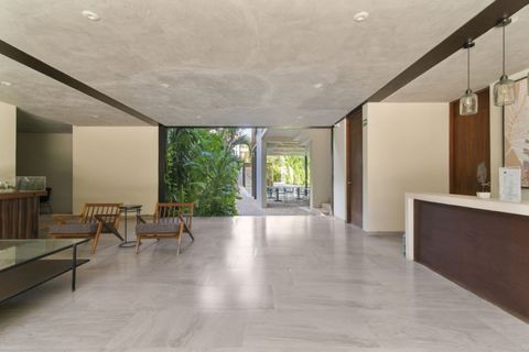 Welcome to our modern reception area, where open-concept design, natural light, and stylish seating create a calm and inviting atmosphere from the moment you arrive.