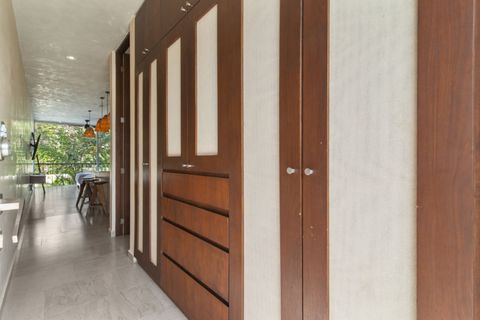 Spacious built-in wooden closets with drawers provide plenty of room to unpack and stay organized during your stay.