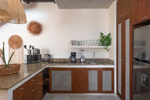 The kitchen is open plan and with plenty of counter top which is ideal for meal preparation. The kitchen comes fully equipped with all the amenities like a coffee machine, blender, water boiler...