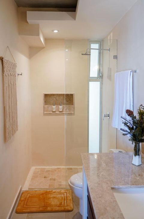The third bathroom is also a full suite bathroom with walk in shower
