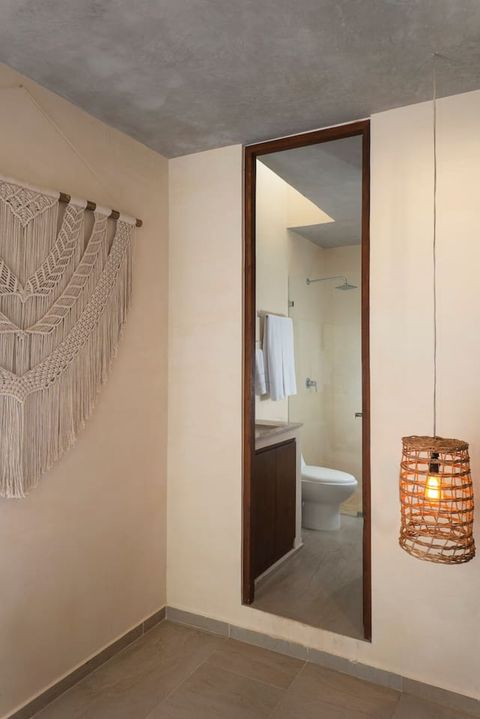 In the apartment you will find three full bathrooms and a half bathroom. This is the half bathroom located by the living room