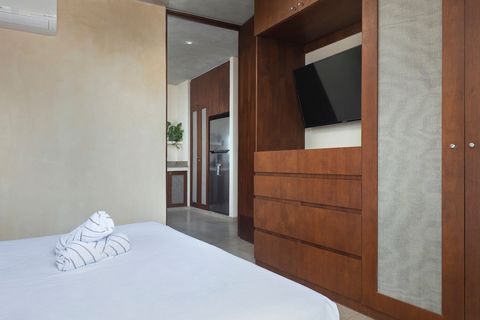 Here you can see the amount of extra storage you will have access to in the master suite. This room also comes with a Smart TV, perfect for a movie night in bed