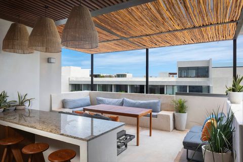 On the rooftop terrace, you'll find a super nice outside kitchen with a bar area, a outside dining area, and a private pool of course