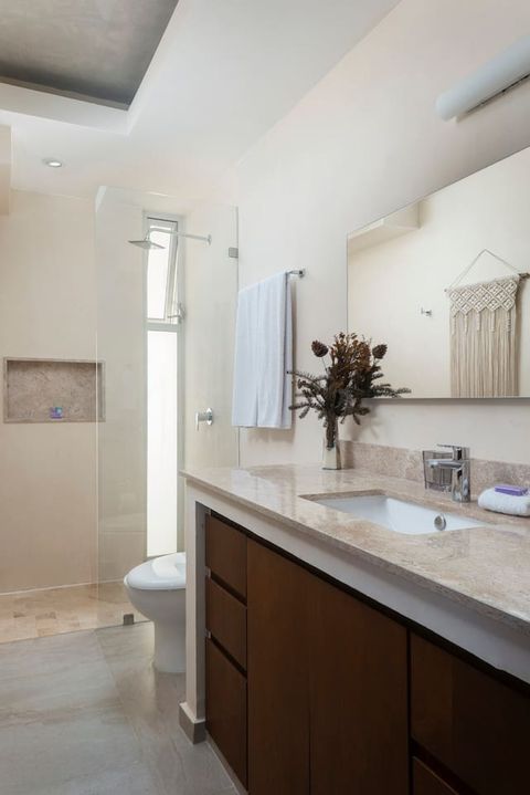 The bathrooms are all spacious with sufficient storage space to keep things organized in the bathroom