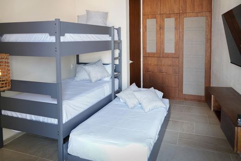 The third bed can be attached closer to the other beds or it can be left separate as you wish