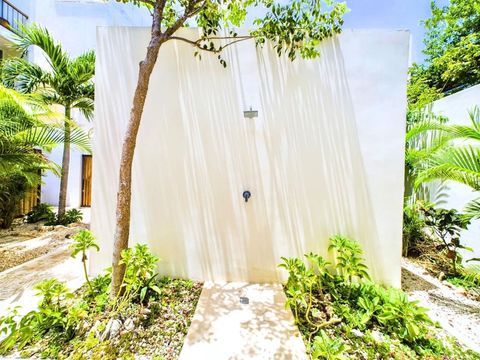 Experience convenience and style in our open shower area, featuring luxurious amenities. Perfect for a refreshing rinse after a day in the sun, this stylish space ensures you can easily clean off before diving back into relaxation.