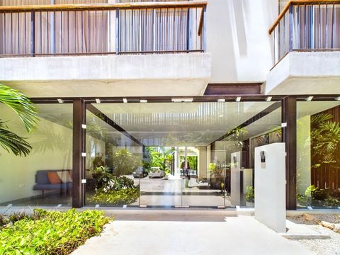 The charming exterior of the building, complete with a welcoming lounge glass door, creates an inviting atmosphere for all guests as they arrive.