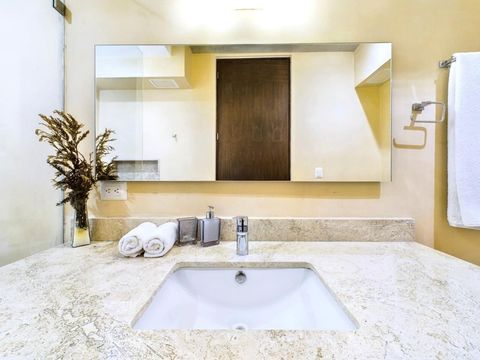 The stylish and functional full bathroom is designed to enhance your experience, providing everything you need to unwind after a day of adventure in Tulum.