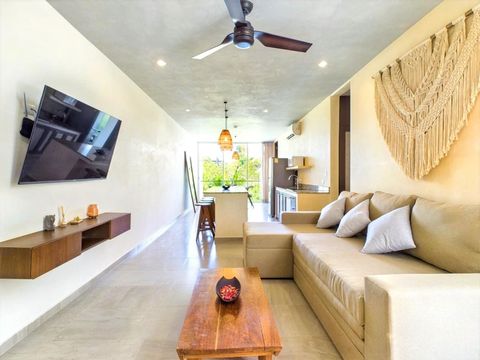 Experience spacious elegance in the open-concept living and dining area, designed to be bright and airy for a welcoming atmosphere.