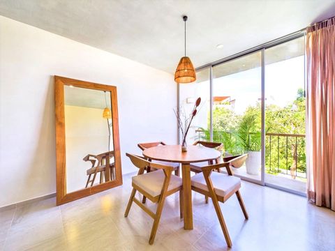 The stylish décor and large mirror add a touch of sophistication to the living space, creating an inviting environment for relaxation and enjoyment.