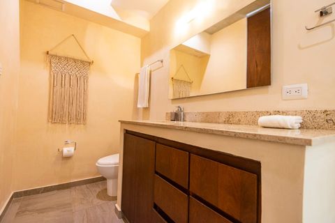 By the rooftop area you will find a half bathroom which you can use for day use or with outside guests