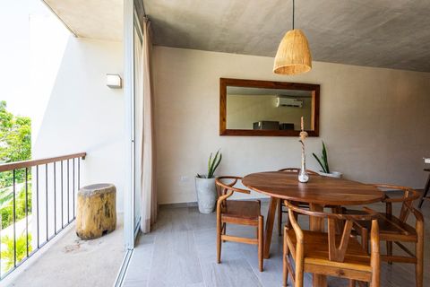 In the living room you will find a nice dining area with a beautiful dining table which can sit 4 people comfortably