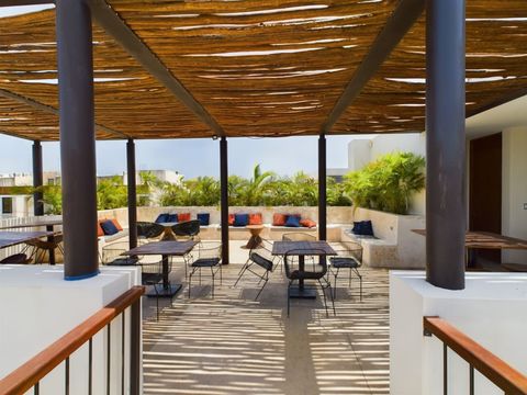 The residence also offers a fantastic rooftop area with some shaded spaces and a bar. All our guests have access to this space and can use it freely as they wish