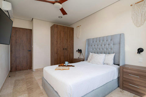 Enjoy the comfort of our second bedroom with a king-size bed, Smart TV, and private balcony. Perfect for relaxing, enjoying quiet moments, or savoring peaceful views from your own space.