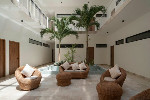 Enjoy our elegant, comfortable common areas surrounded by greenery—perfect for socializing, relaxing, or soaking in peaceful, nature-filled moments during your stay.