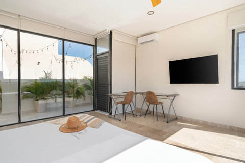 Retreat to this private haven with a king-size bed, desk, smart TV, and balcony—perfect for relaxing, working, or enjoying serene moments with stunning views.