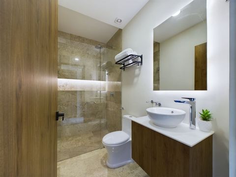 Indulge in our well-appointed bathrooms! We offer premium towels and toiletries so you can fully relax and enjoy your stay. #SpaExperience #GuestComfort