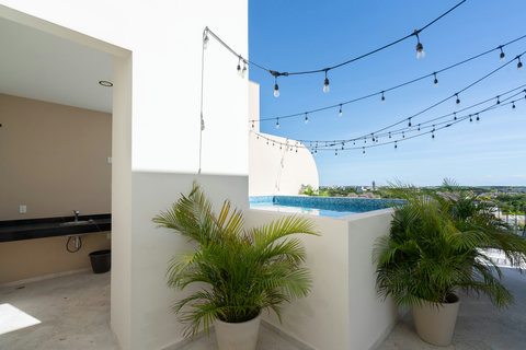 Soak in the sun and serenity at your private rooftop pool, with sparkling waters and panoramic views for moments of total relaxation and bliss.