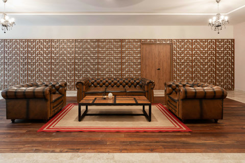 Unwind in our elegant lobby area, featuring plush seating and a serene ambiance—perfect for relaxing, waiting, or enjoying a quiet moment in style.