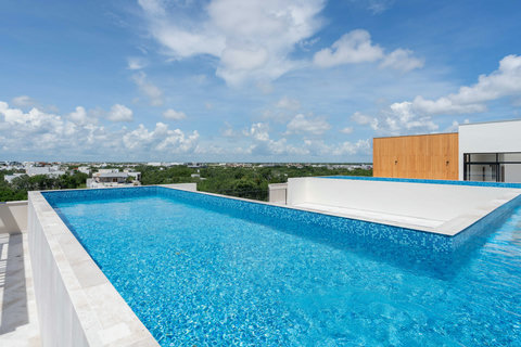 Make lasting memories at the rooftop pool of Giada Towers! Swim, soak up the sun, and enjoy beautiful views.