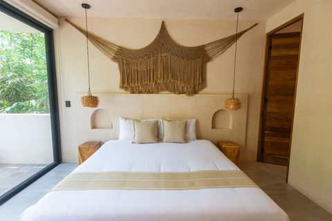 Boho-inspired king bedroom with a minimalist design, built-in niches, and warm wooden accents. A cozy escape blending nature and comfort.