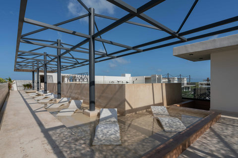 Enjoy a stylish rooftop oasis with chic loungers, sunny open-sky views, and a peaceful atmosphere. It’s the perfect place to relax, recharge, and enjoy the contemporary outdoor ambiance.