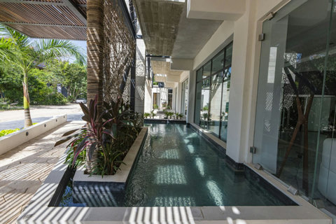 Discover a tranquil haven where simplicity meets intricate design amidst nature's embrace. A serene abode crafted for comfort, offering the ultimate destination to relax and rejuvenate.
