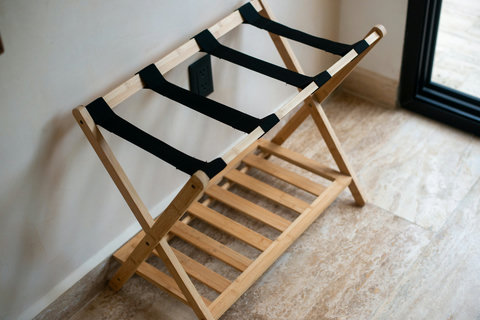 This stylish bamboo drying rack offers a practical and eco-friendly way to dry your clothes, adding convenience to your stay.