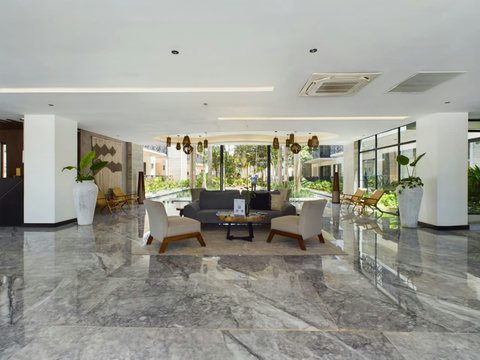 Welcome to our lobby, a cozy reception area with a variety of seating options, creating a warm and welcoming atmosphere to greet our guests upon arrival.